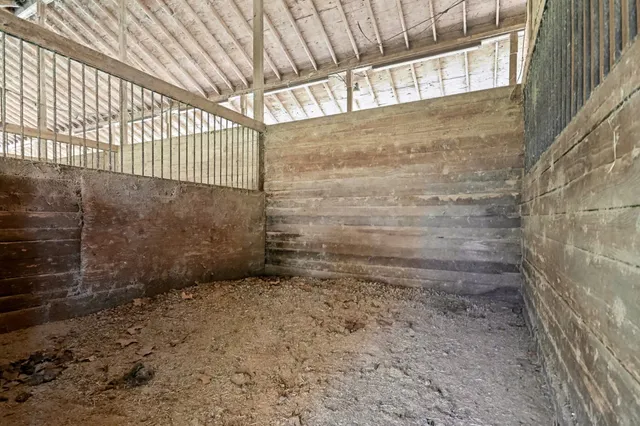 a view of a car park in front of house