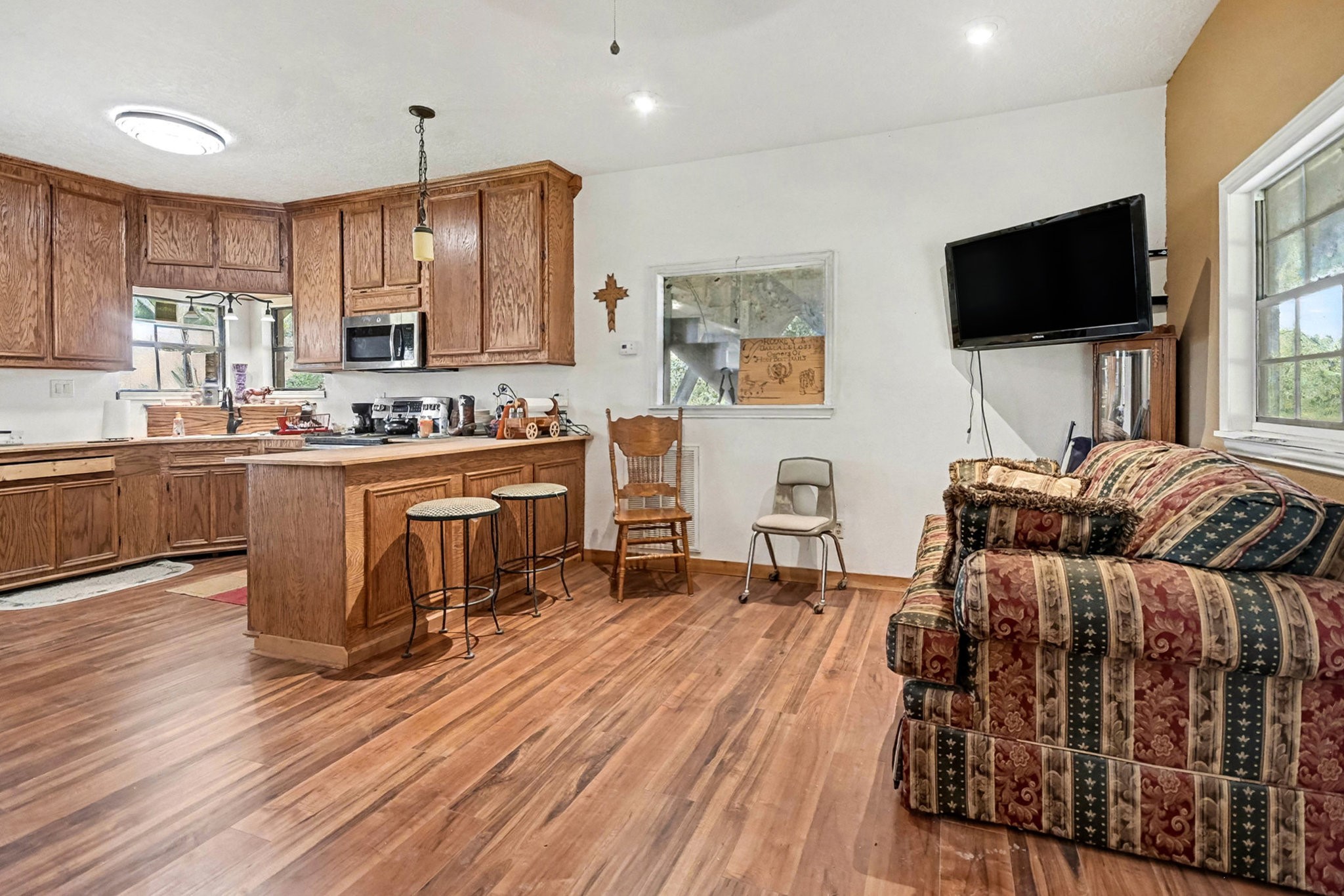 18303 Ramsey Road Crosby, TX 77532 - Photo 20 of 24 a living room with furniture and a flat screen tv