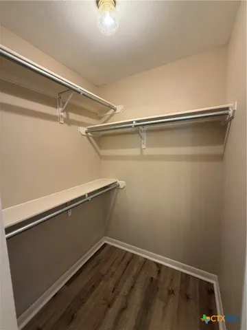 a view of a room with rack on the wall