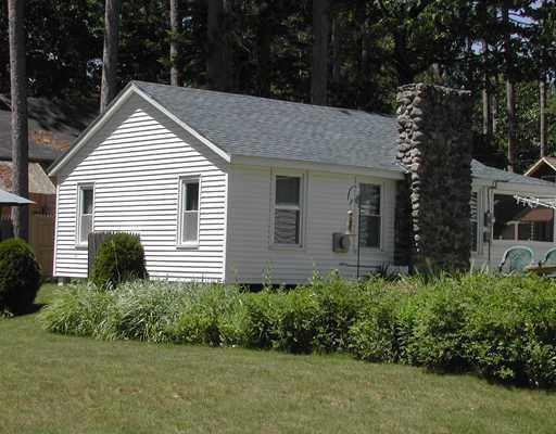 28 Pickering Street Sebago, ME 04029 - Photo 16 of 22 Other. rear of cottage opening on to...