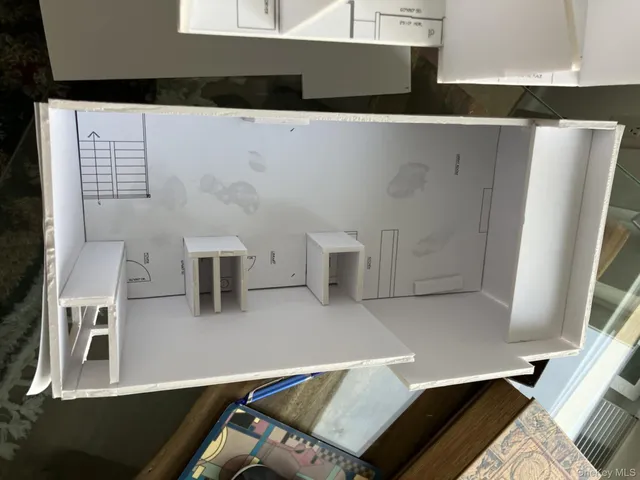 a view of furniture and wooden floor