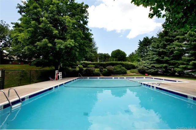 a view of a park with swings and slides