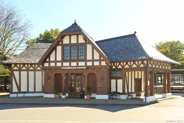 a view of a swimming pool with a lawn chairs
