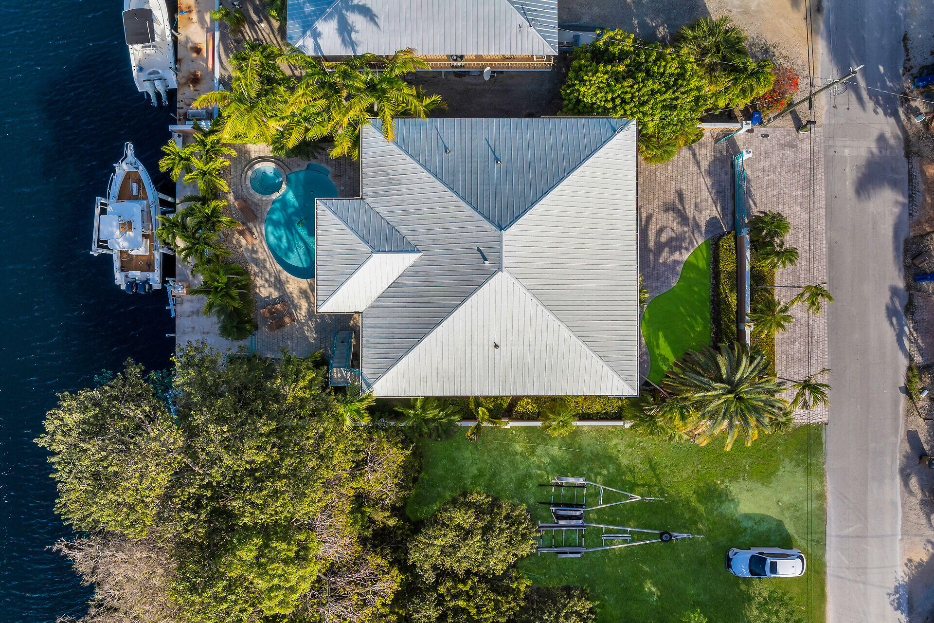 10 South Exuma Road Key Largo, FL 33037 - Photo 12 of 47 an aerial view of a house with a yard
