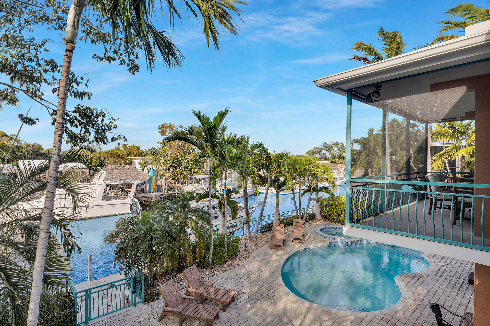10 South Exuma Road Key Largo, FL 33037 - Photo 15 of 47 a view of a swimming pool with a patio