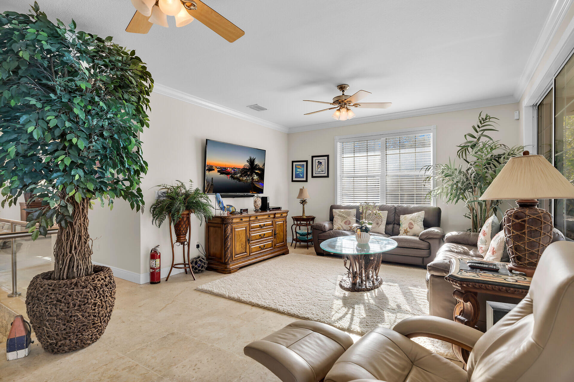 10 South Exuma Road Key Largo, FL 33037 - Photo 25 of 47 a living room with furniture potted plant and a window