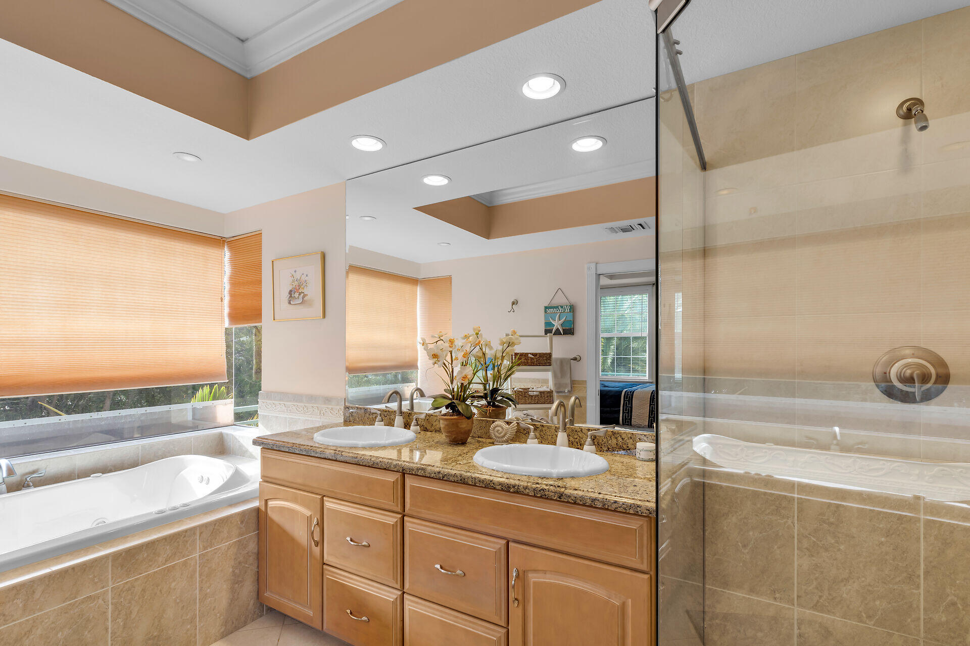 10 South Exuma Road Key Largo, FL 33037 - Photo 31 of 47 a bathroom with a granite countertop sink and a bathtub