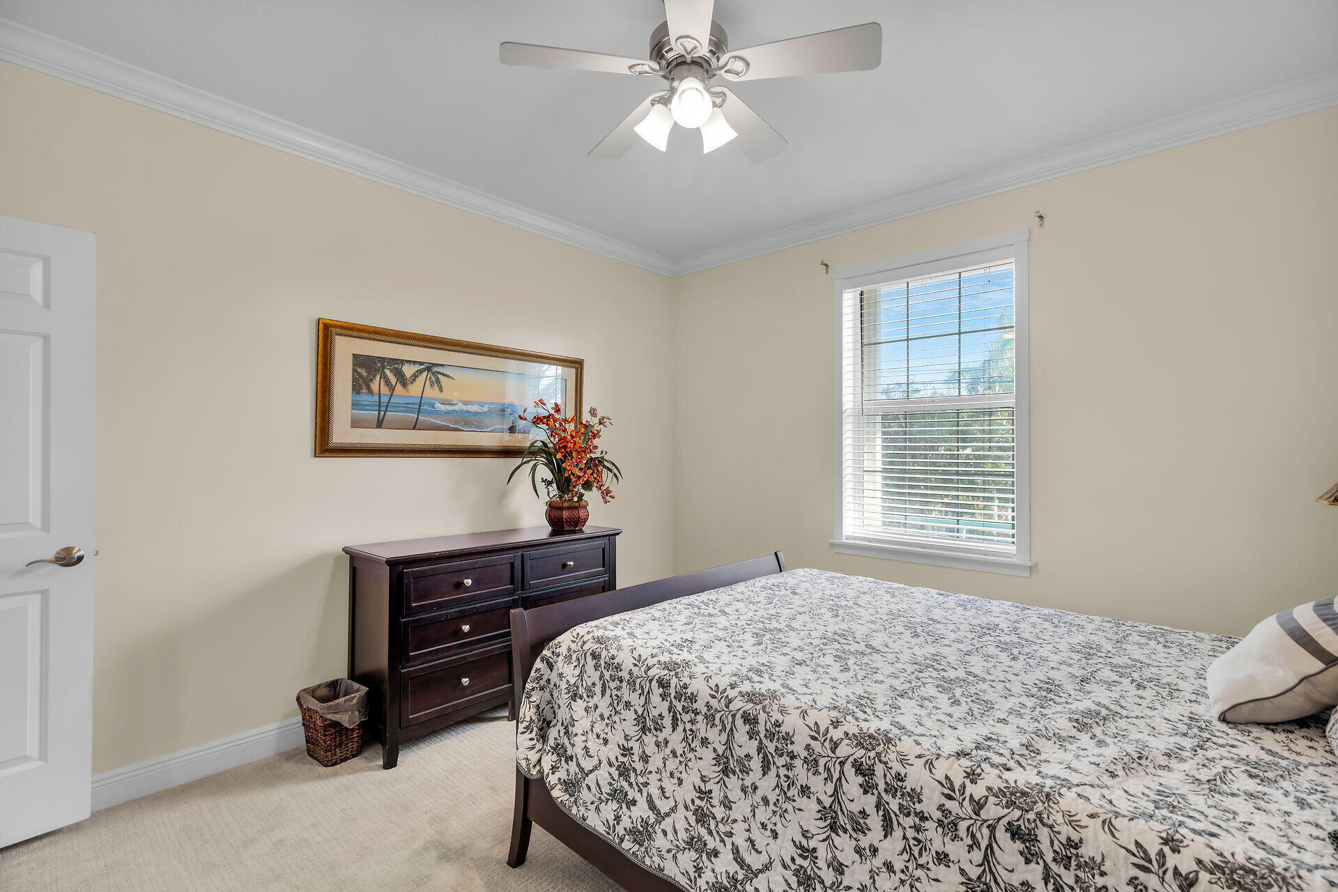 10 South Exuma Road Key Largo, FL 33037 - Photo 34 of 47 a bedroom with a bed and a chandelier