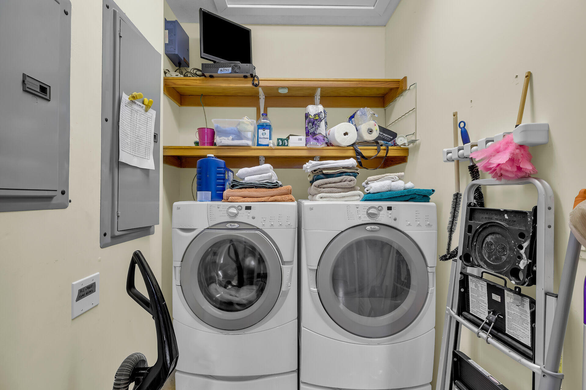 10 South Exuma Road Key Largo, FL 33037 - Photo 41 of 47 a utility room with dryer washer and a view of living & kitchen