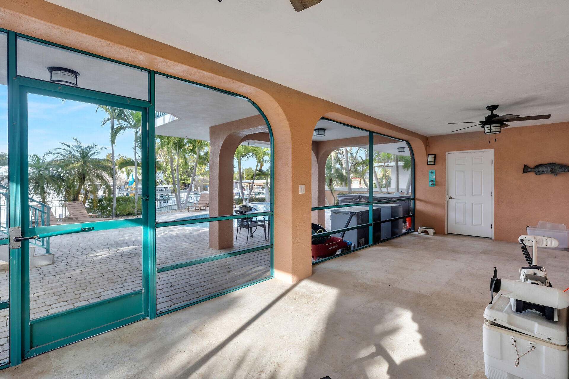 10 South Exuma Road Key Largo, FL 33037 - Photo 45 of 47 a view of an empty room with large windows
