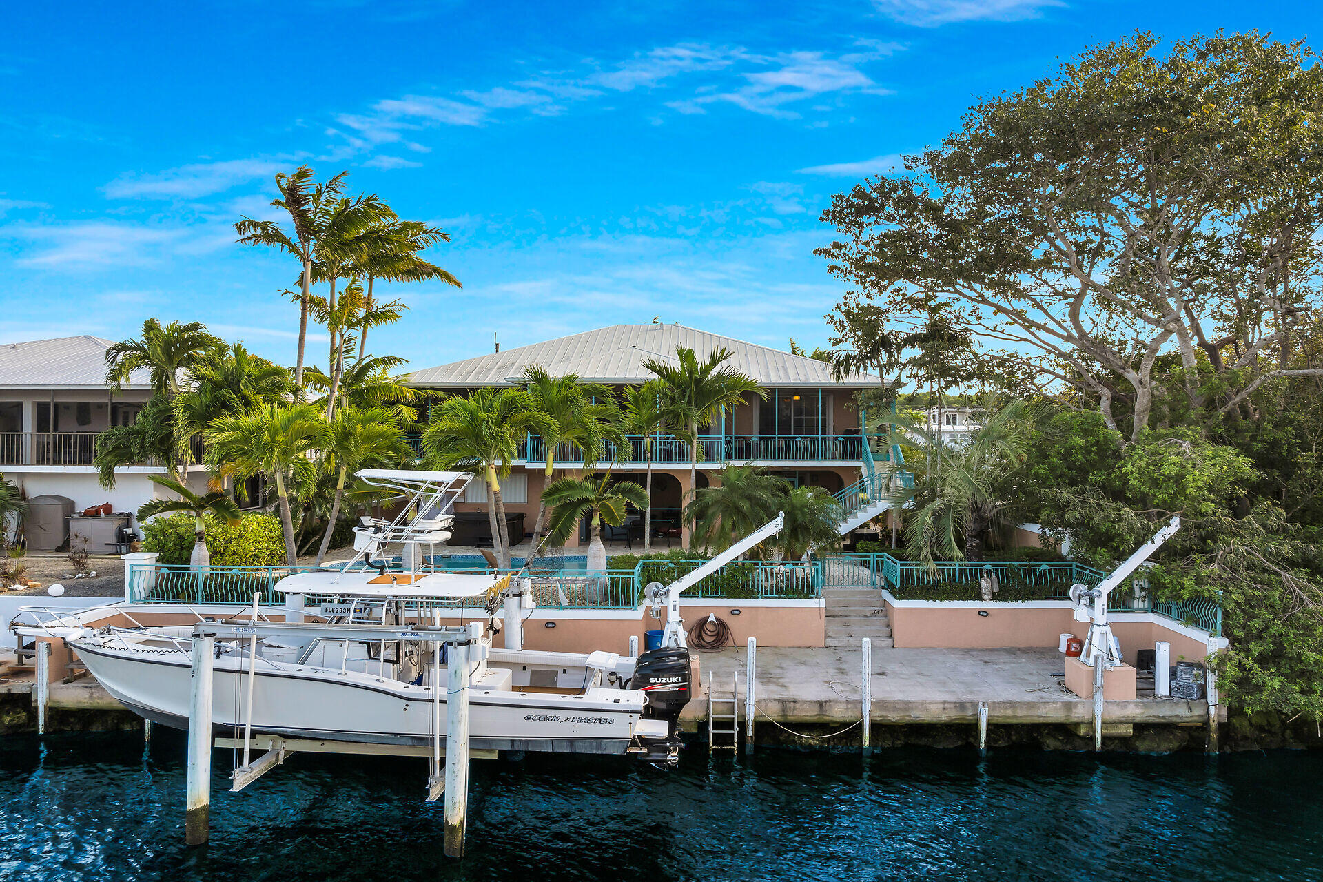 10 South Exuma Road Key Largo, FL 33037 - Photo 10 of 47 a view of house with backyard and outdoor seating