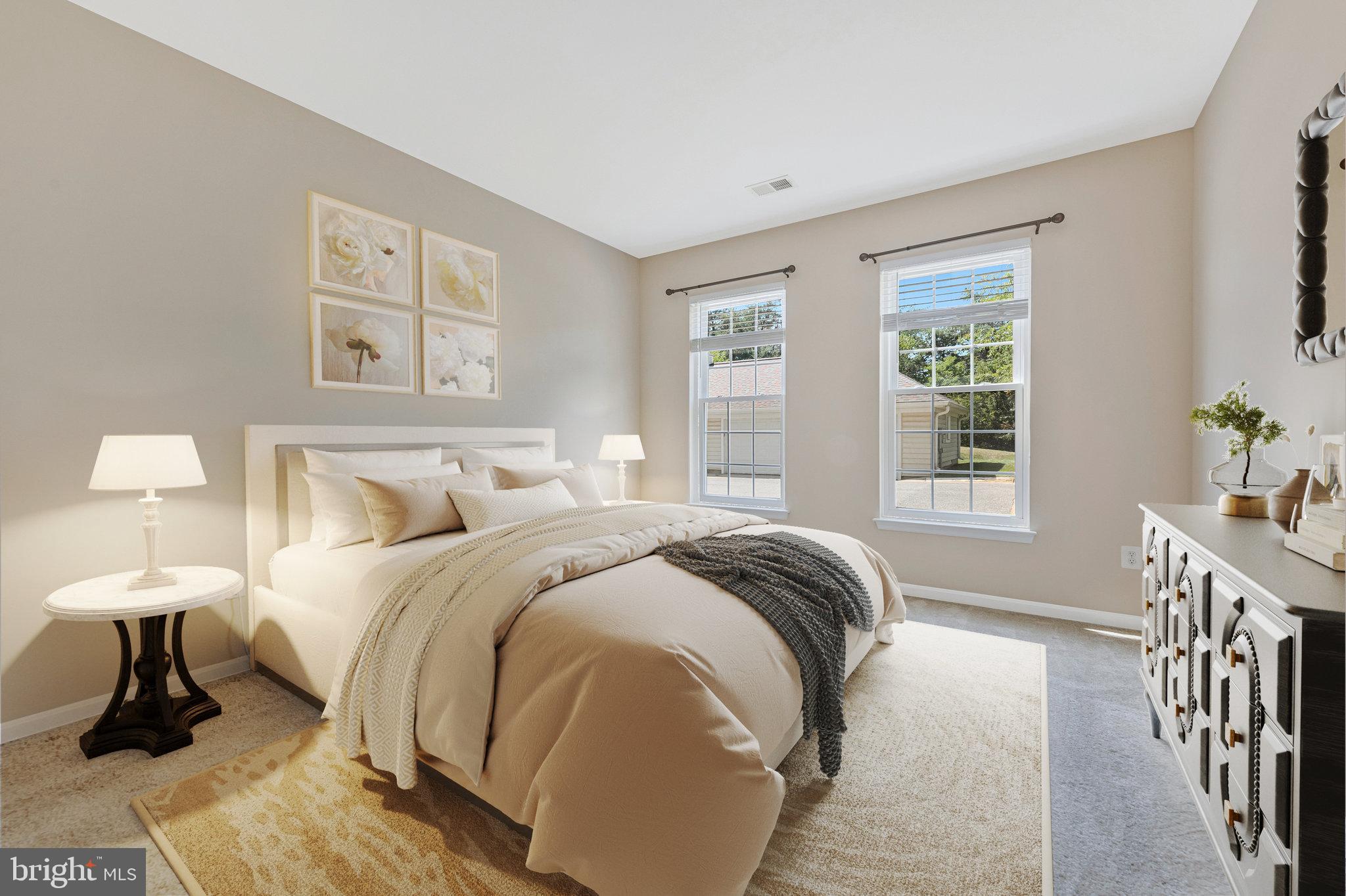 8600 Roaming Ridge Way, Unit 106 Odenton, MD 21113 - Photo 23 of 52 a bedroom with a bed and a window