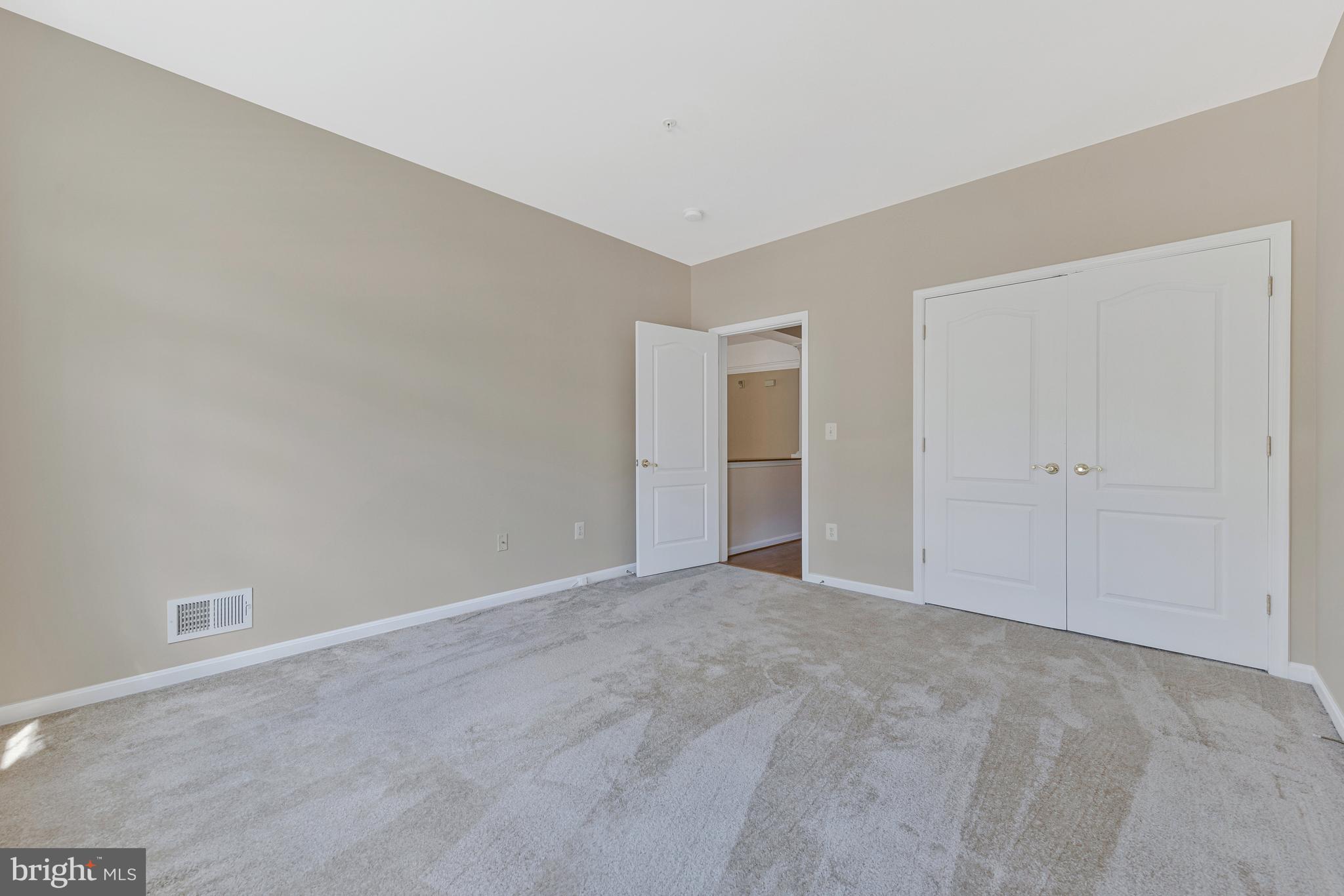 8600 Roaming Ridge Way, Unit 106 Odenton, MD 21113 - Photo 24 of 52 a view of an empty room