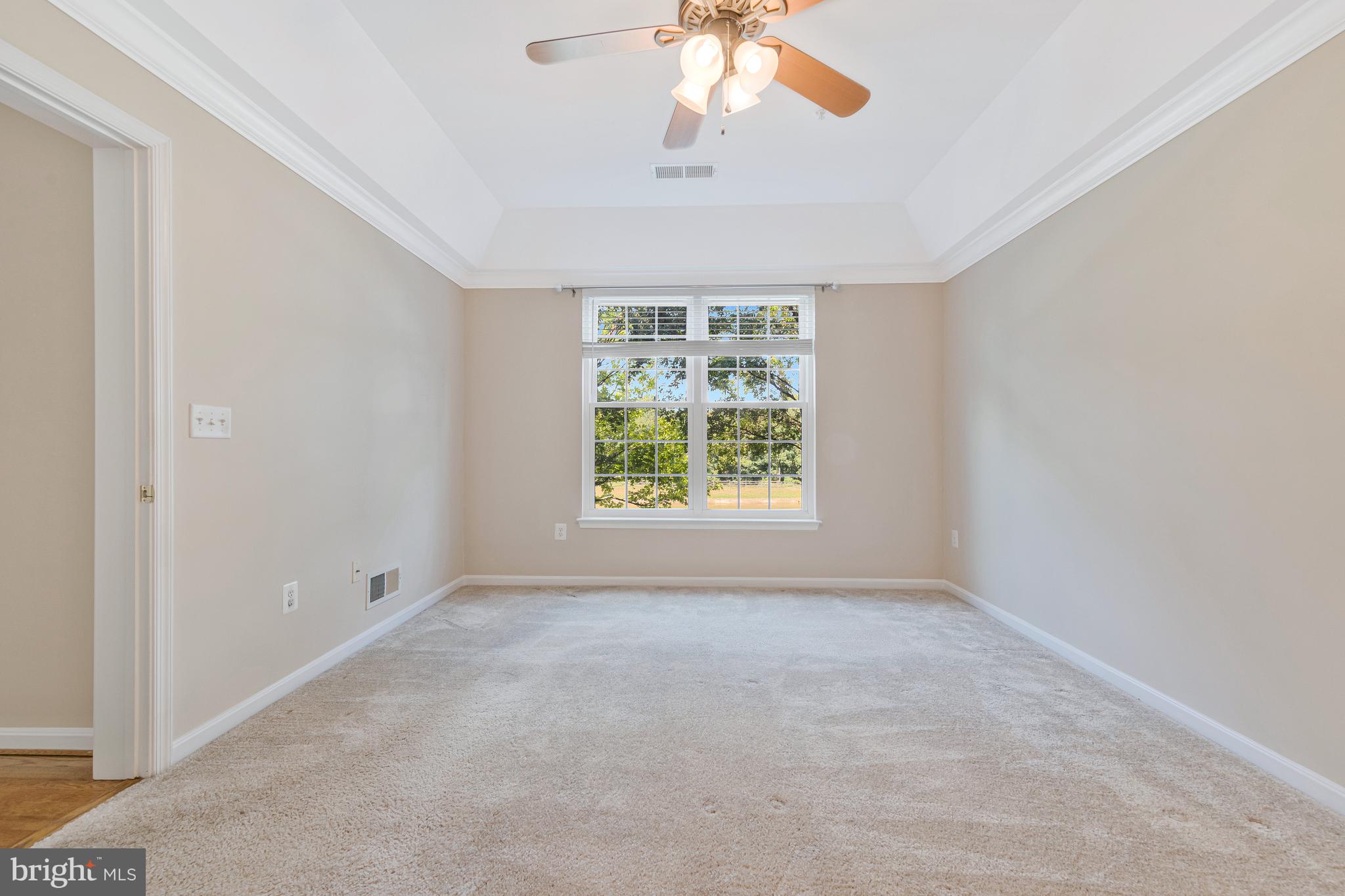 8600 Roaming Ridge Way, Unit 106 Odenton, MD 21113 - Photo 26 of 52 a view of an empty room with a window
