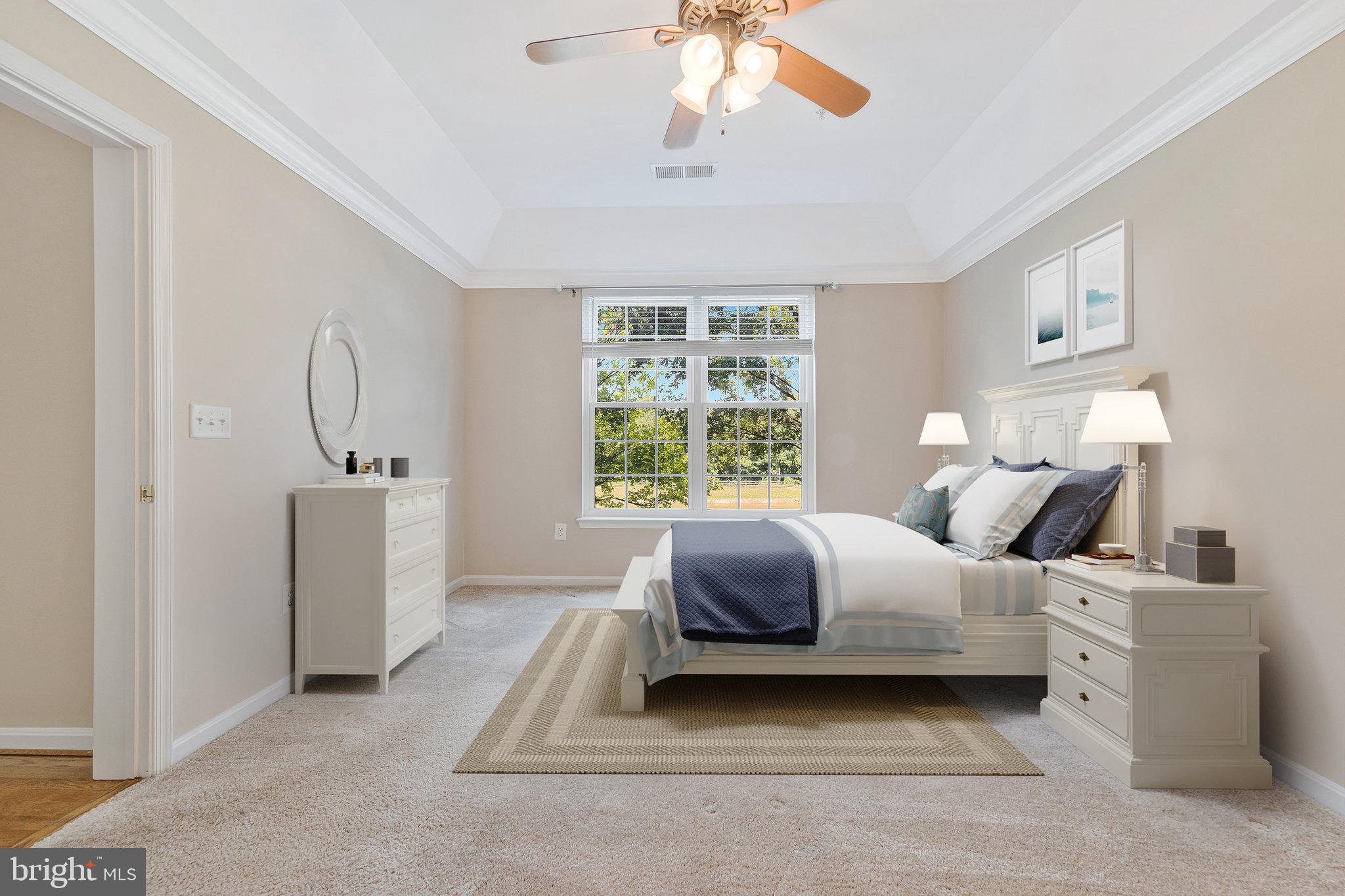 8600 Roaming Ridge Way, Unit 106 Odenton, MD 21113 - Photo 27 of 52 a bedroom with bed and a window