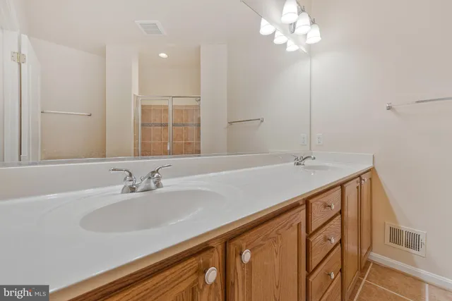 a bathroom with a shower and toilet