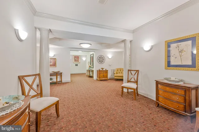 a living room with furniture and a piano