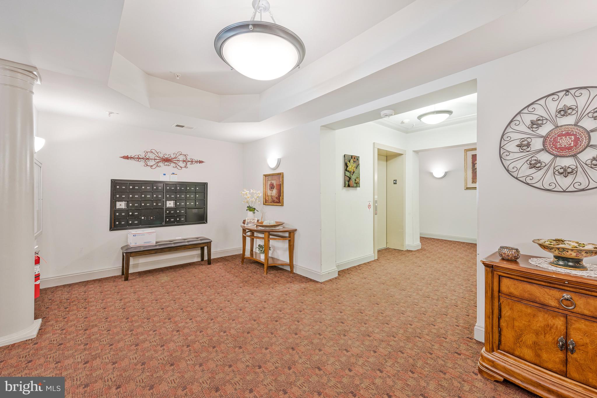 8600 Roaming Ridge Way, Unit 106 Odenton, MD 21113 - Photo 38 of 52 a view of a livingroom with furniture and a window