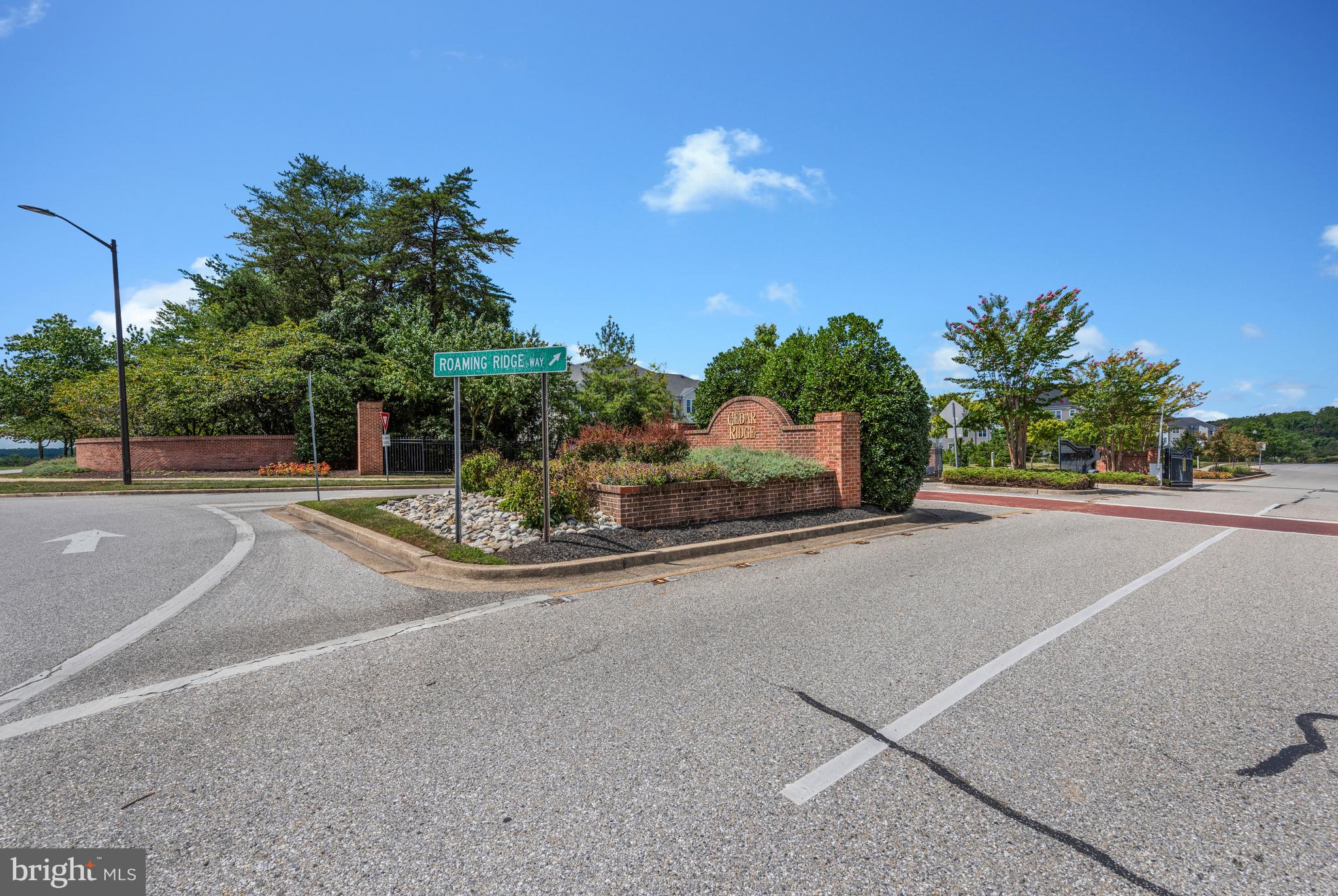 8600 Roaming Ridge Way, Unit 106 Odenton, MD 21113 - Photo 39 of 52 a house view with a outdoor space