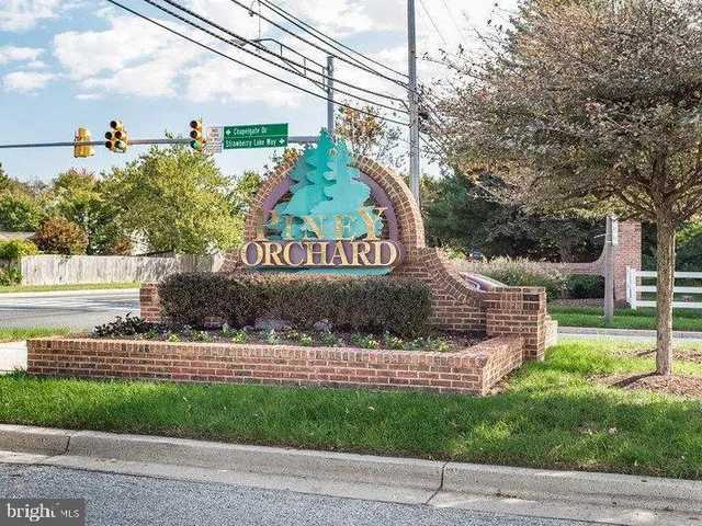 a view of house with swimming pool outdoor seating