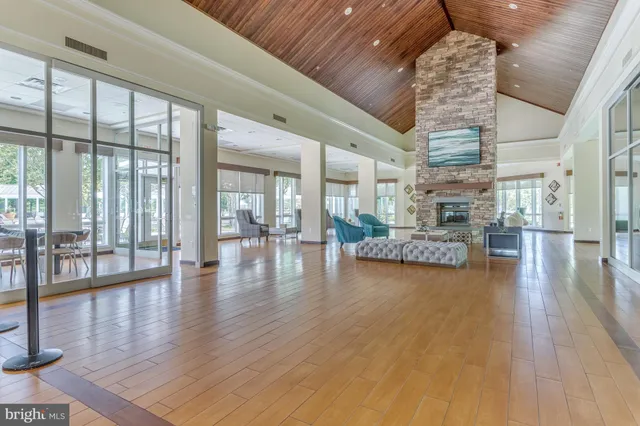 a very nice looking dining room with a large window