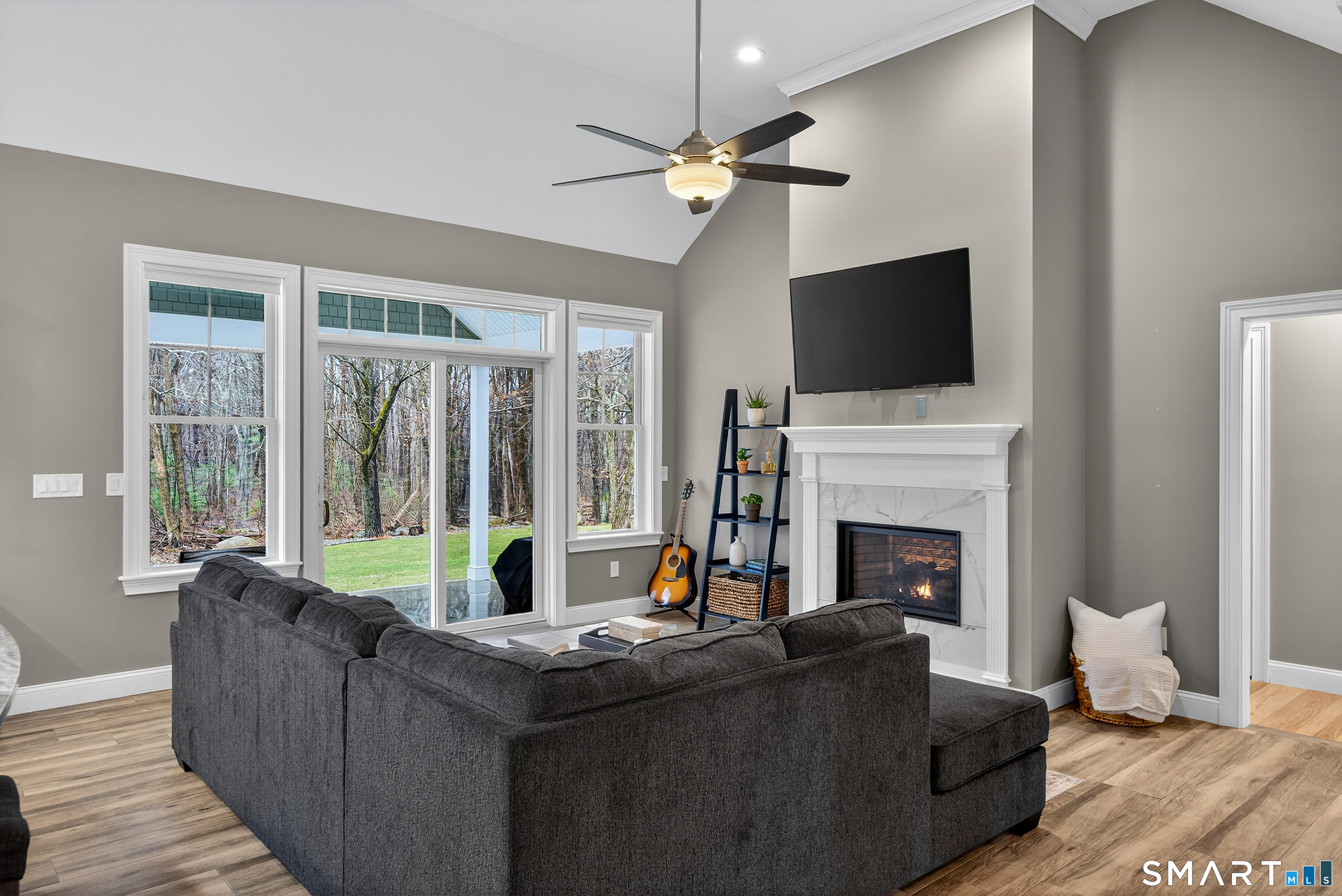 91 Hampden Road Stafford, CT 06076 - Photo 11 of 40 a living room with furniture and a fireplace