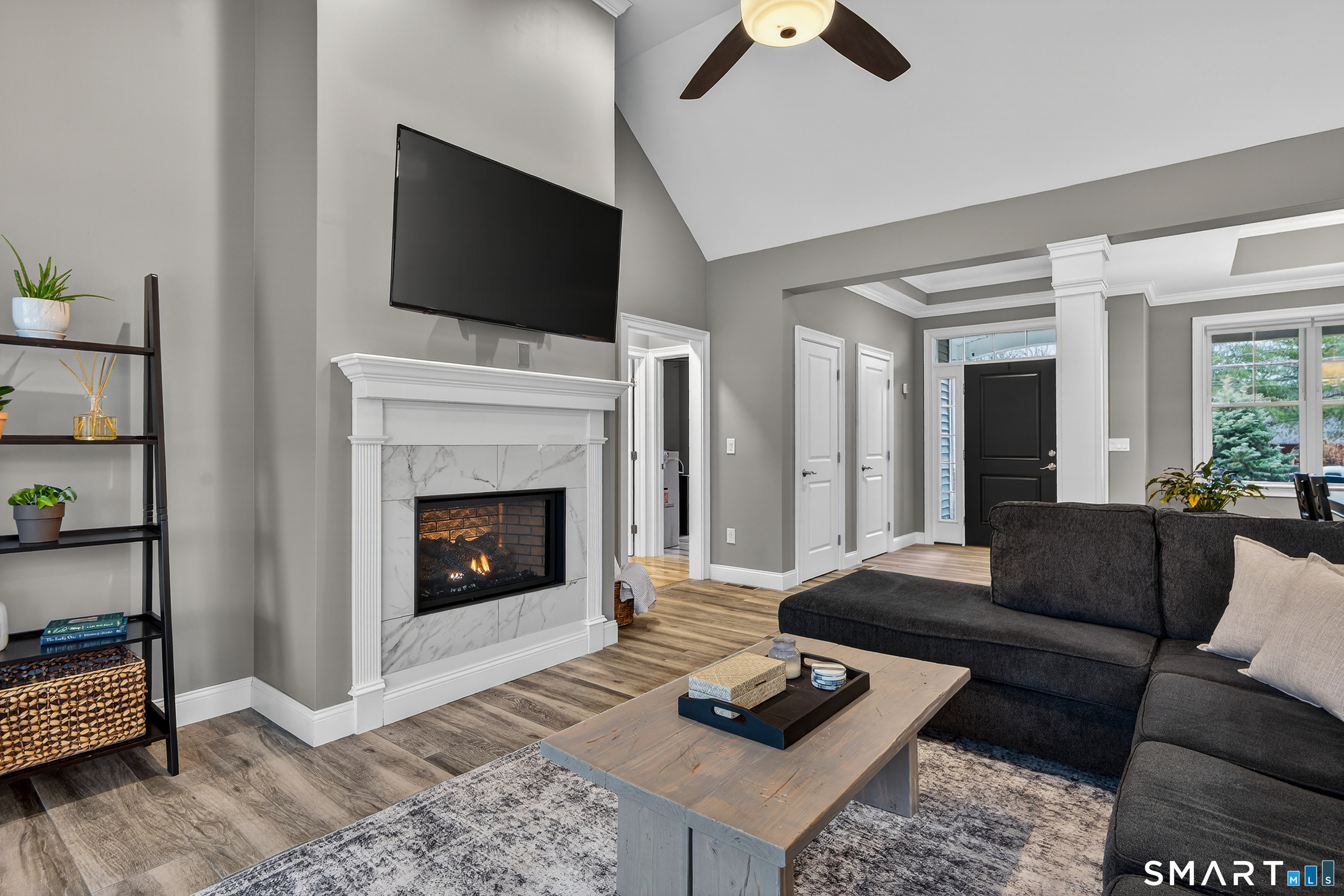 91 Hampden Road Stafford, CT 06076 - Photo 12 of 40 a living room with furniture and a fireplace