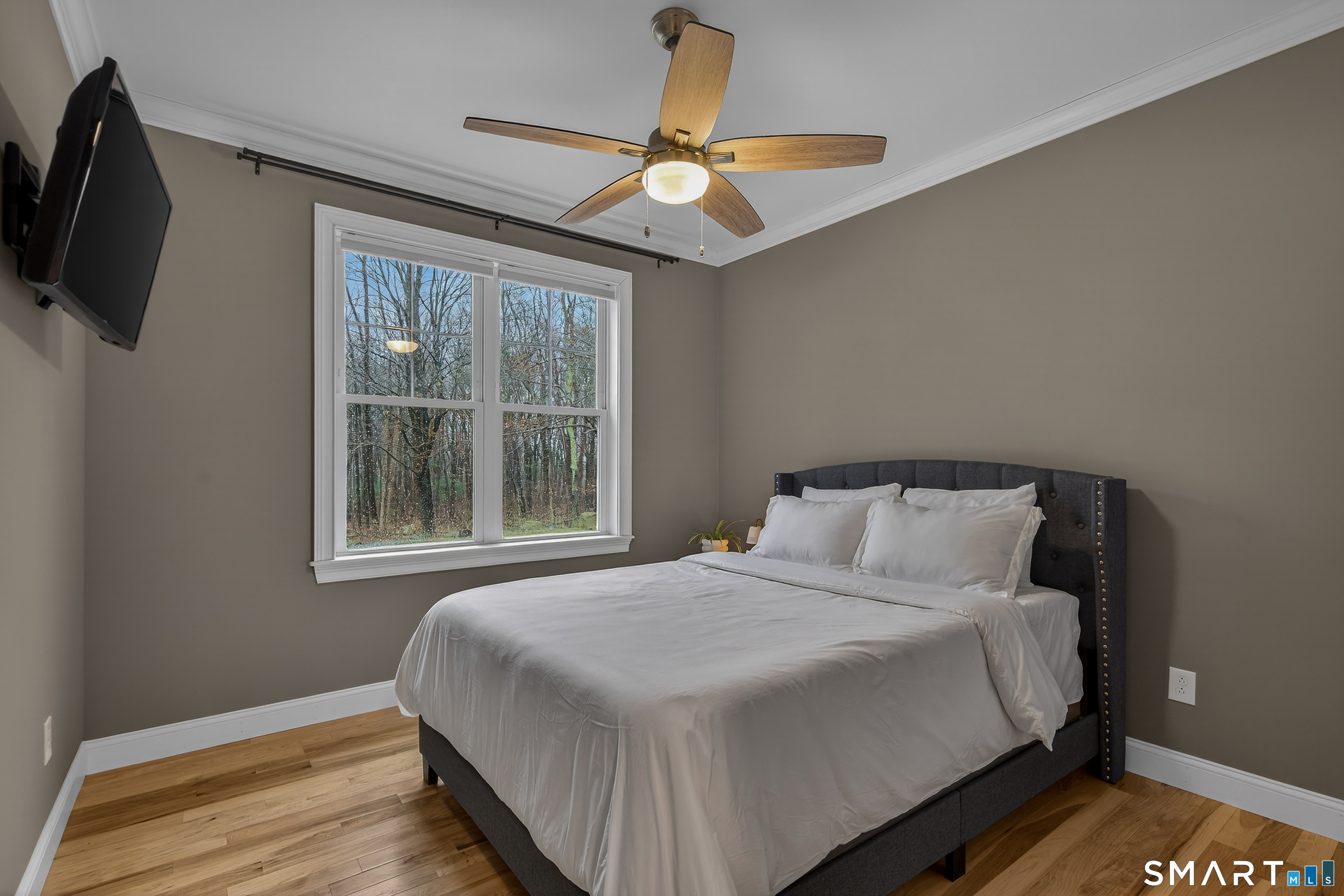 91 Hampden Road Stafford, CT 06076 - Photo 23 of 40 a bedroom with a bed and a window