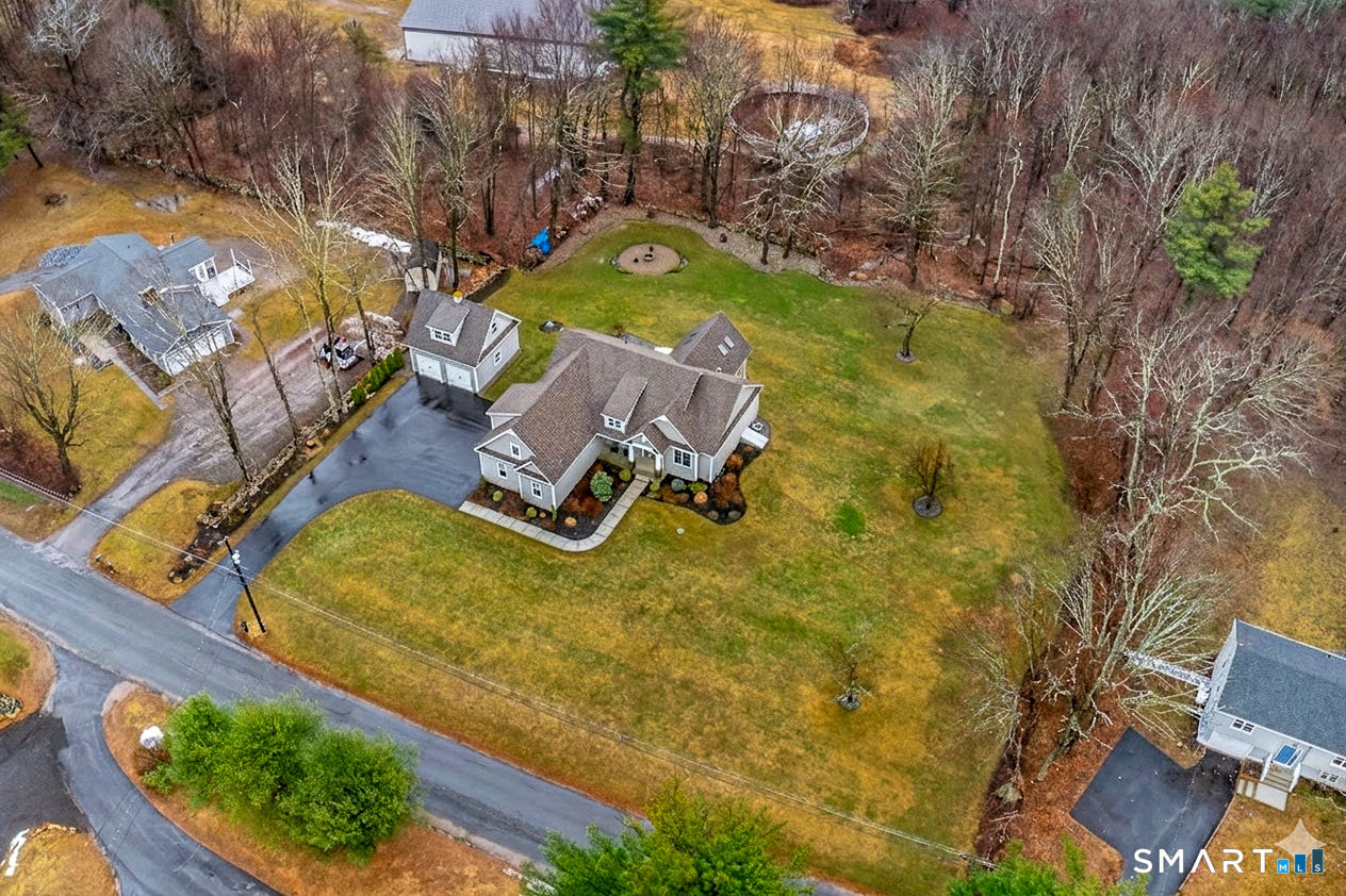 91 Hampden Road Stafford, CT 06076 - Photo 3 of 40 an aerial view of a house with swimming pool and outdoor space