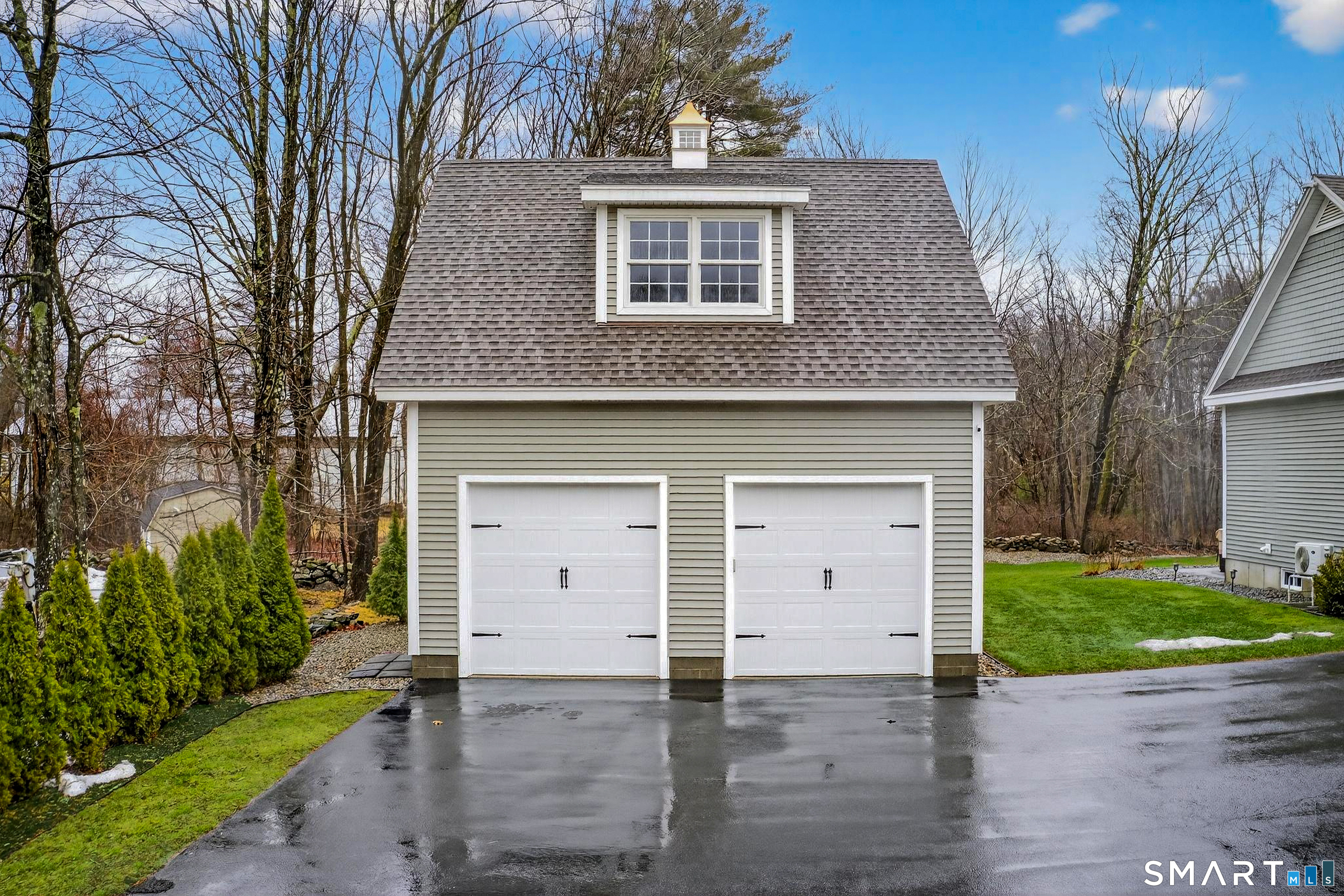 91 Hampden Road Stafford, CT 06076 - Photo 33 of 40 a front view of a house with a yard and garage