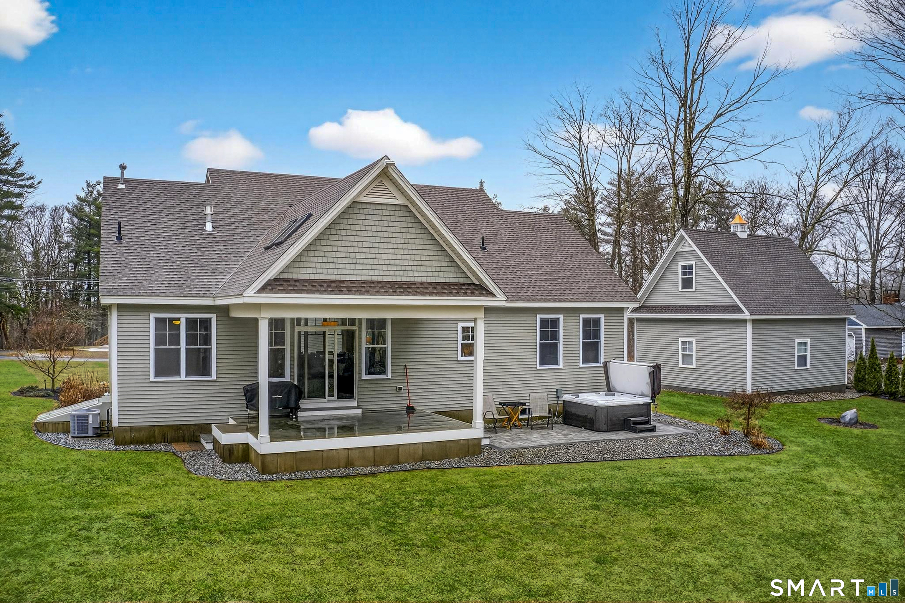 91 Hampden Road Stafford, CT 06076 - Photo 35 of 40 a view of a house with a yard and large tree