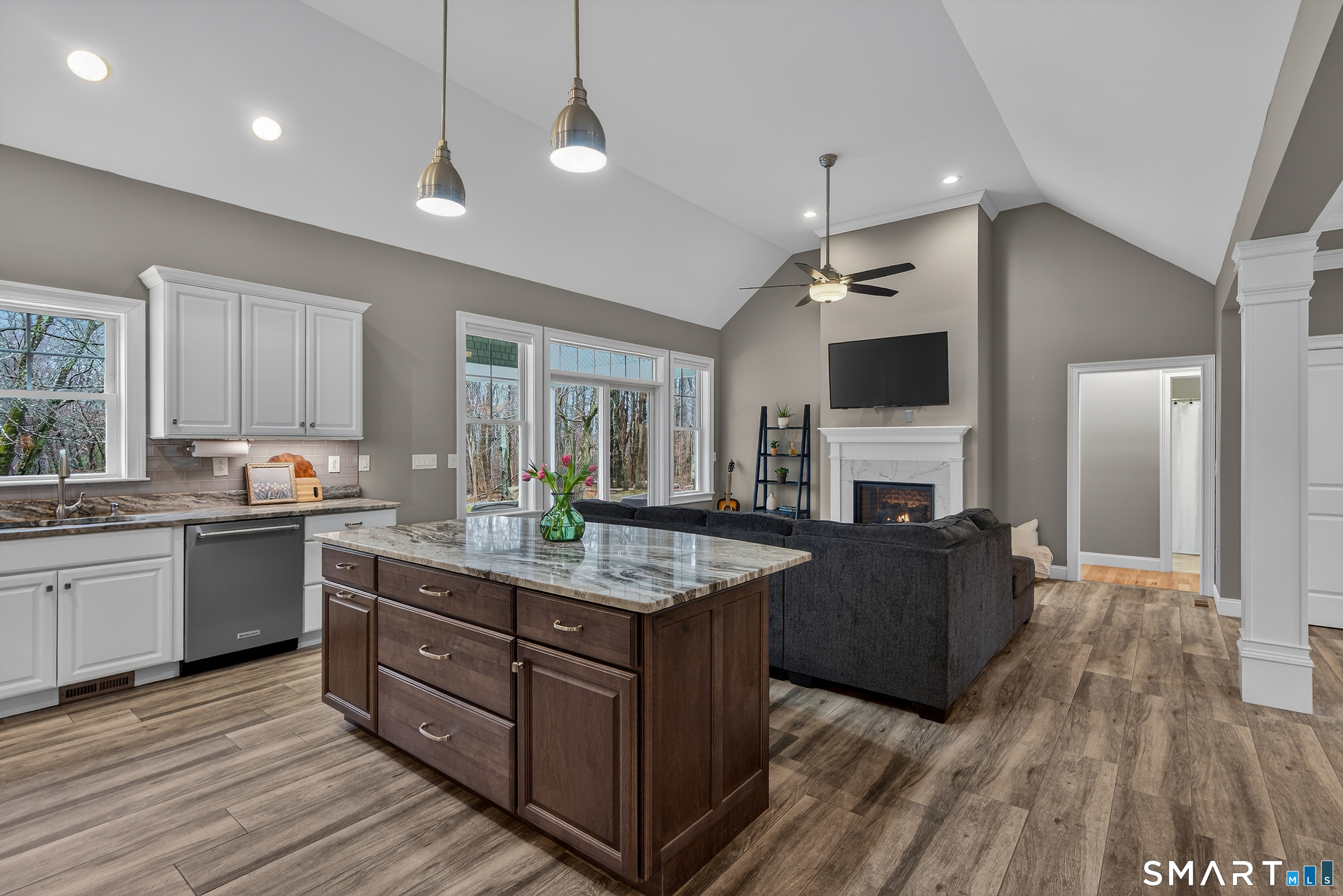 91 Hampden Road Stafford, CT 06076 - Photo 8 of 40 a kitchen with granite countertop a stove oven and a refrigerator