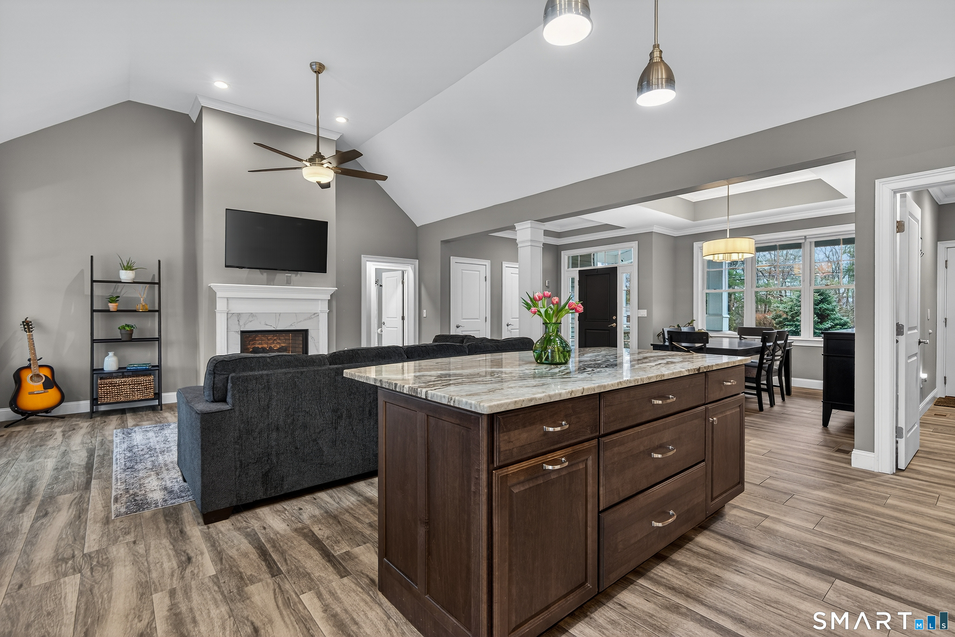 91 Hampden Road Stafford, CT 06076 - Photo 10 of 40 a living room with furniture and a fireplace