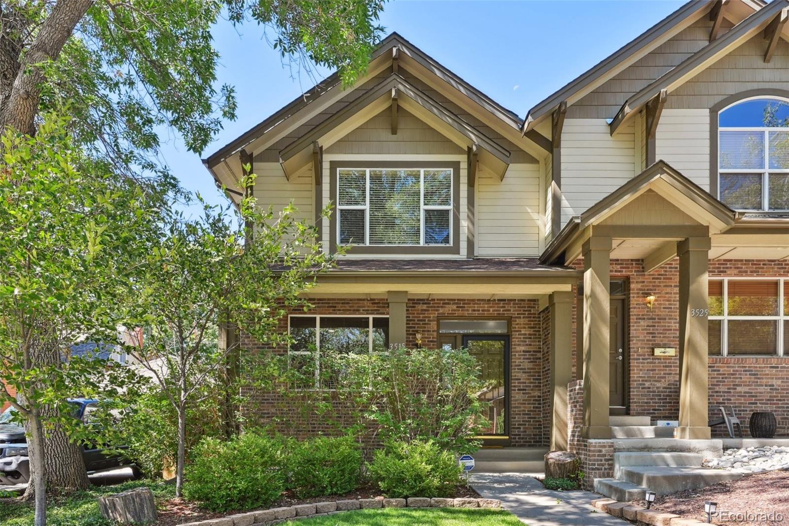 3515 Perry Street Denver, CO 80212 - Photo 1 of 40 a front view of a house with a yard