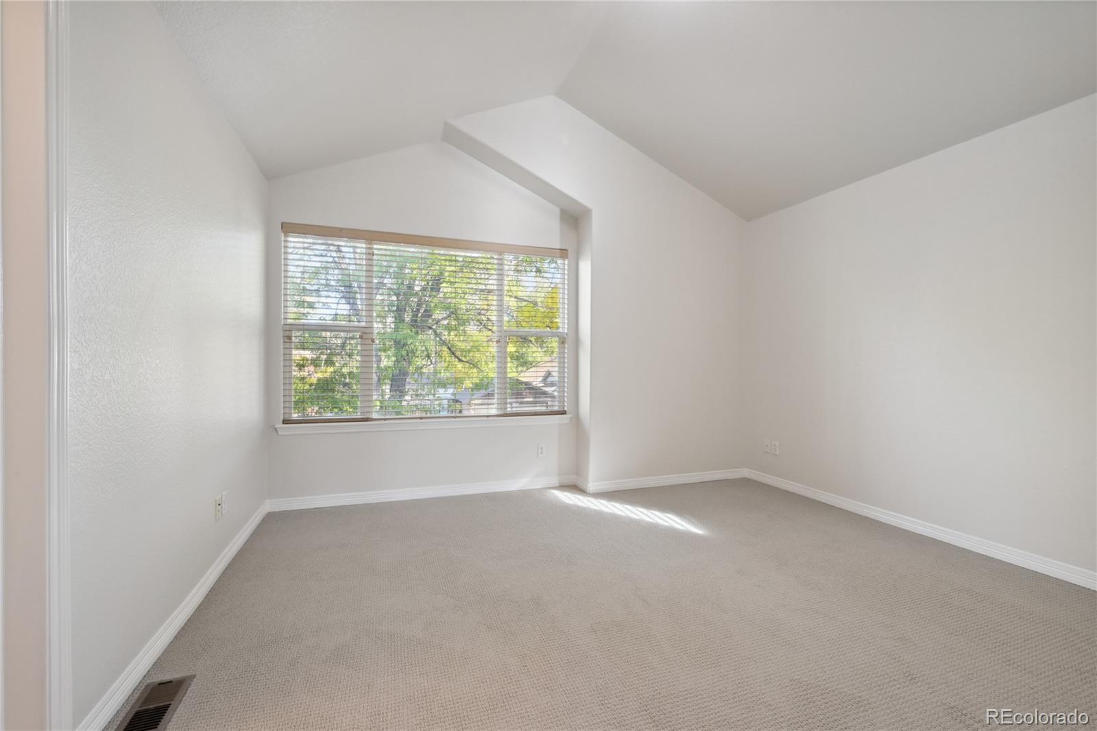 3515 Perry Street Denver, CO 80212 - Photo 21 of 40 an empty room with a window