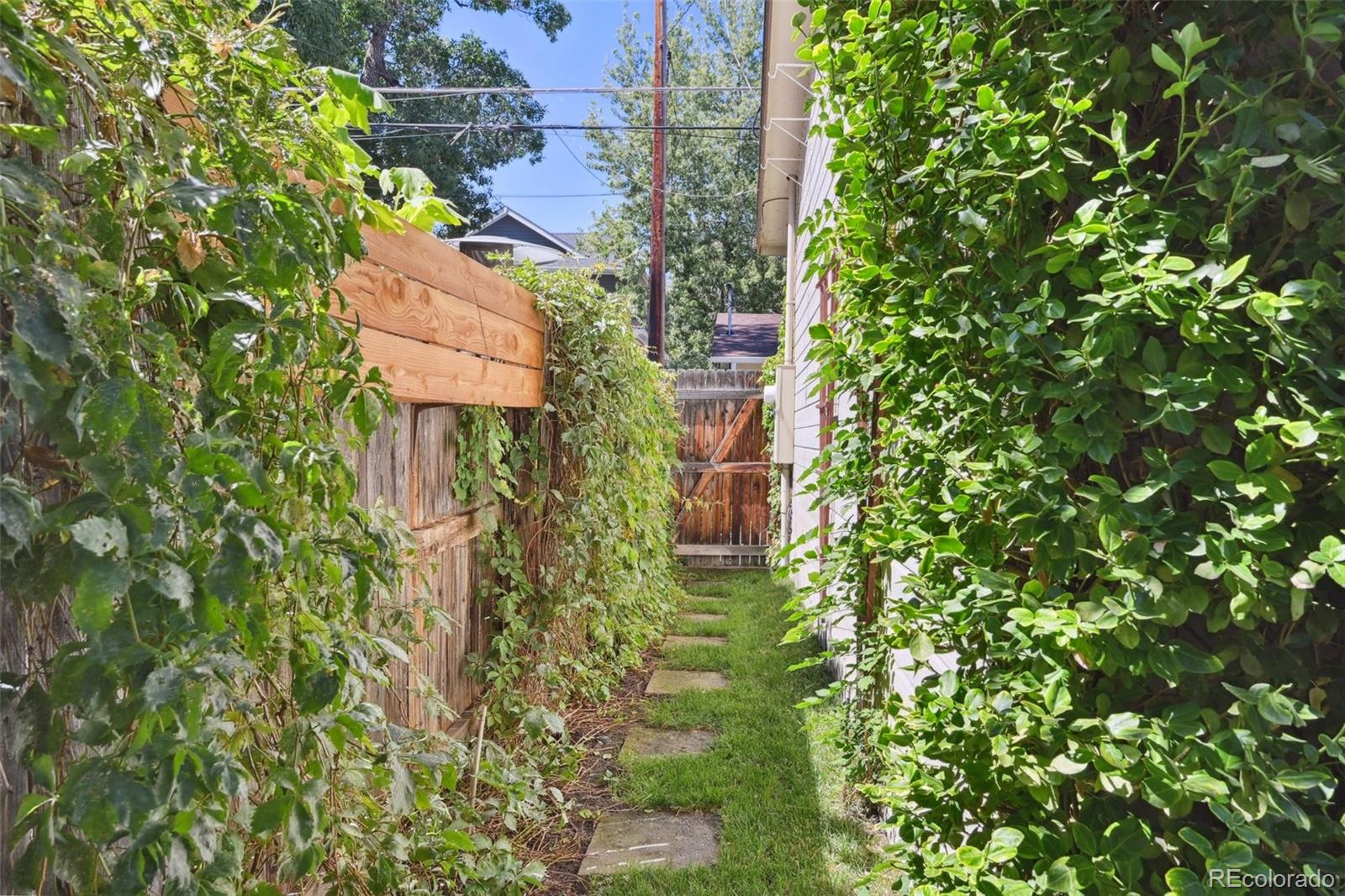 3515 Perry Street Denver, CO 80212 - Photo 33 of 40 an aerial view of residential house with an outdoor space and trees