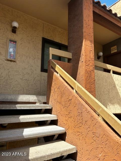 1125 East Broadway Road, Unit 212 Tempe, AZ 85282 - Photo 23 of 42 Stairs up to Condo