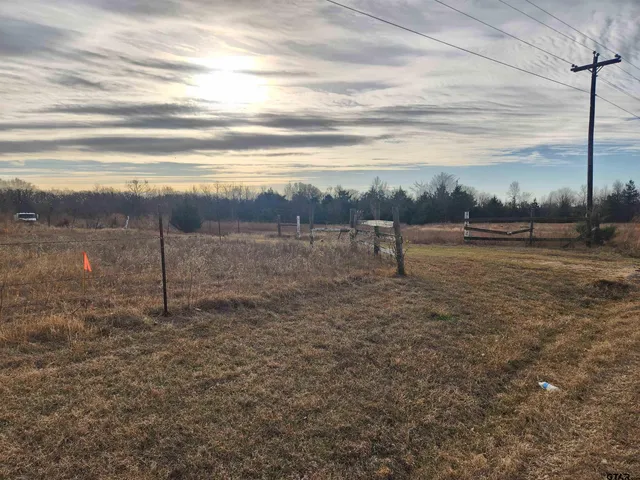 a view of a lake with a big yard