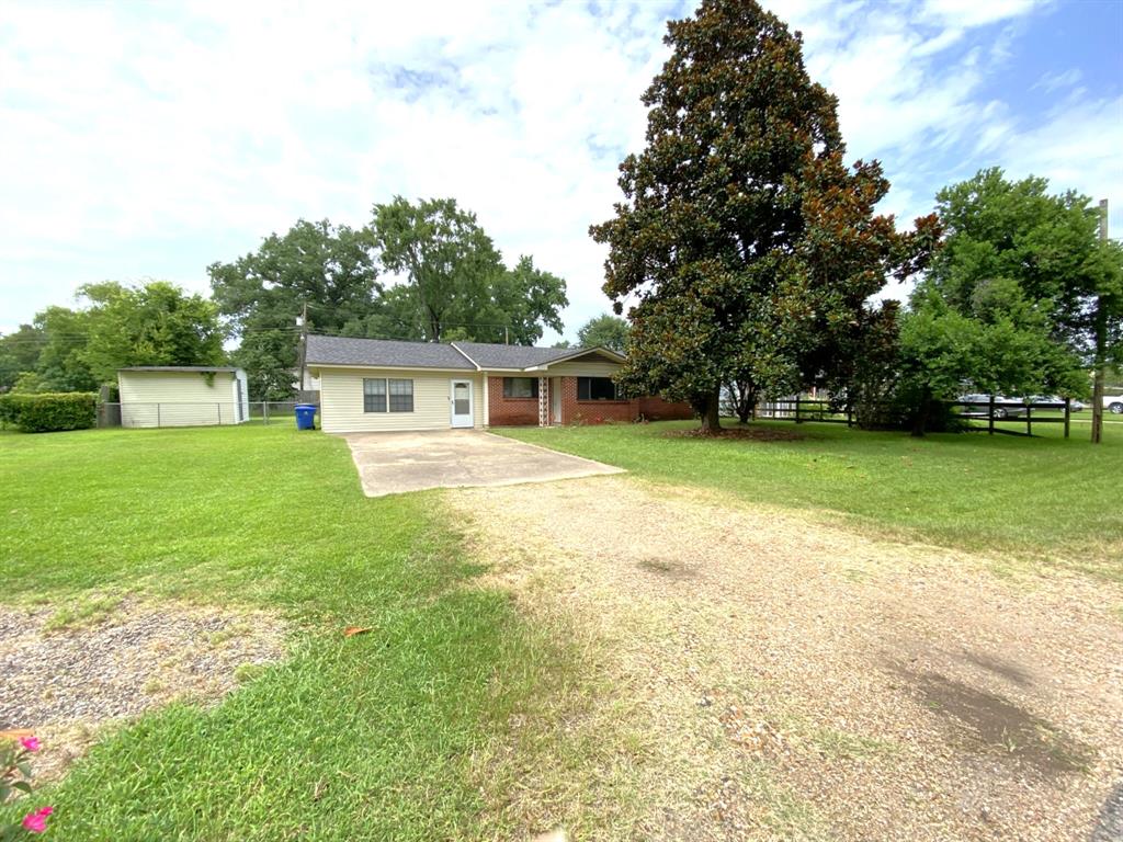 810 Poleman Road Shreveport, LA 71107 - Photo 23 of 25 a view of a house with a yard porch and sitting area
