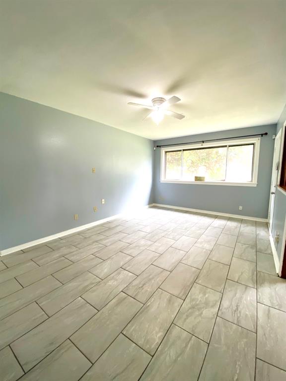 810 Poleman Road Shreveport, LA 71107 - Photo 9 of 25 a view of an empty room and window