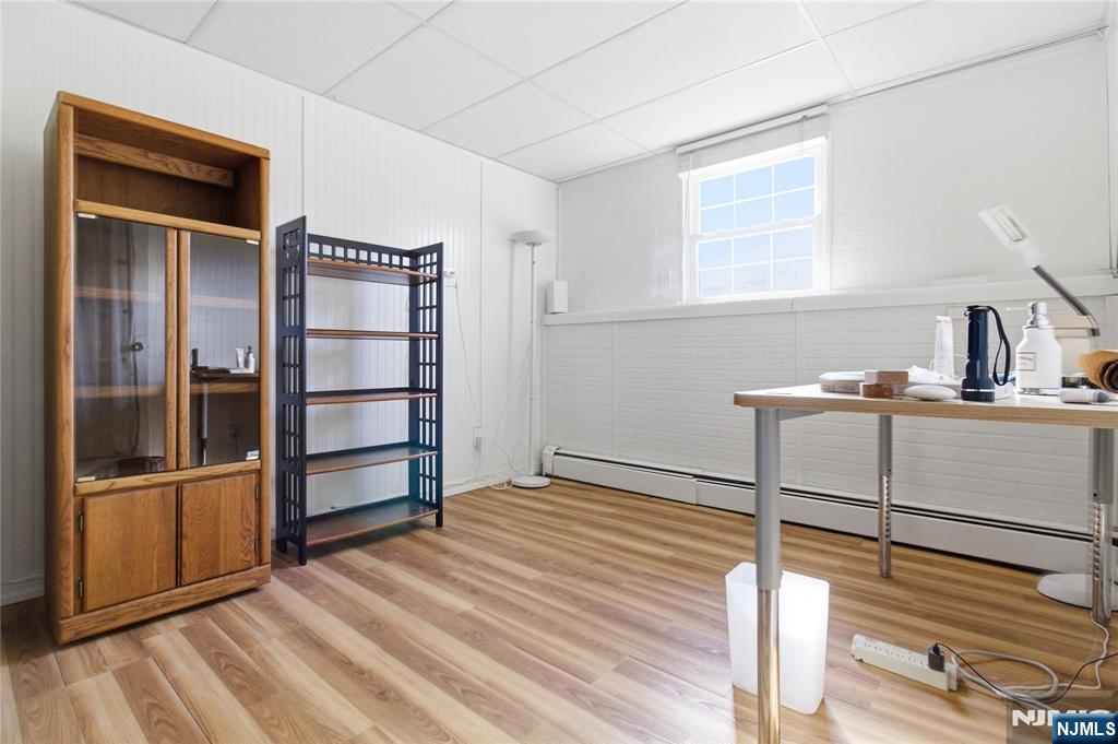 120 Carlough Road Upper Saddle River, NJ 07458 - Photo 11 of 25 a view of empty room with wooden floor