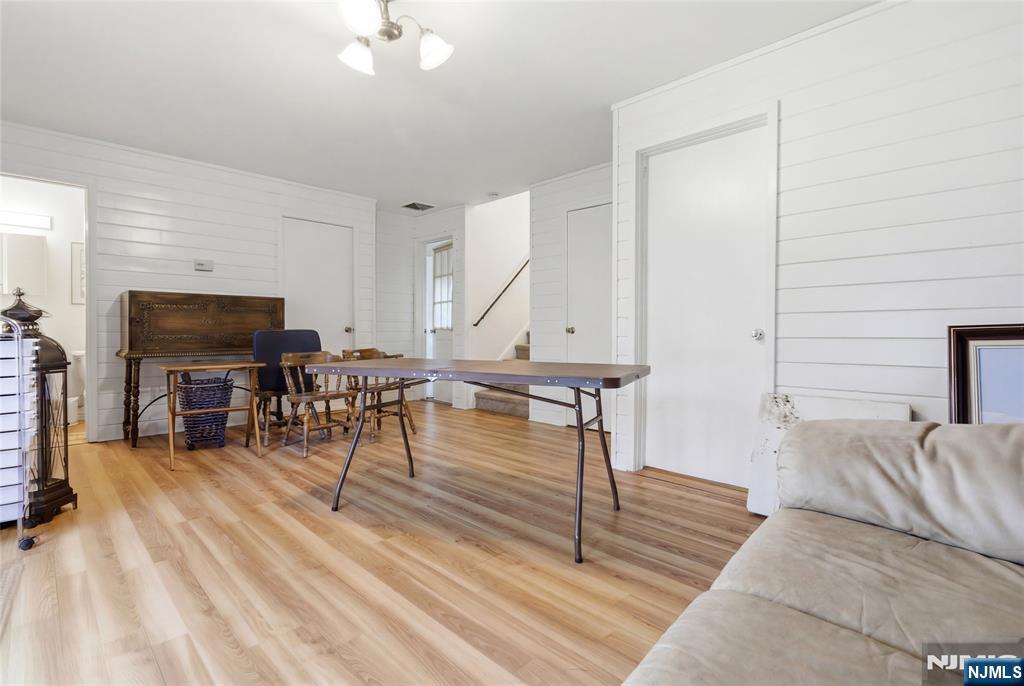 120 Carlough Road Upper Saddle River, NJ 07458 - Photo 13 of 25 a view of a livingroom with furniture and a flat screen tv