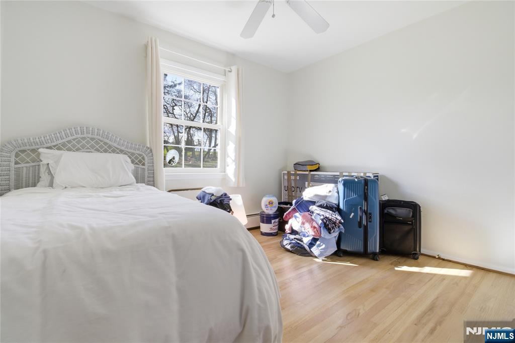 120 Carlough Road Upper Saddle River, NJ 07458 - Photo 14 of 25 a bedroom with a bed and a window