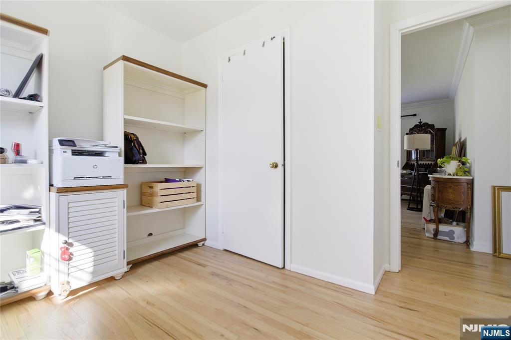 120 Carlough Road Upper Saddle River, NJ 07458 - Photo 19 of 25 a view of a bedroom with workspace and bedroom