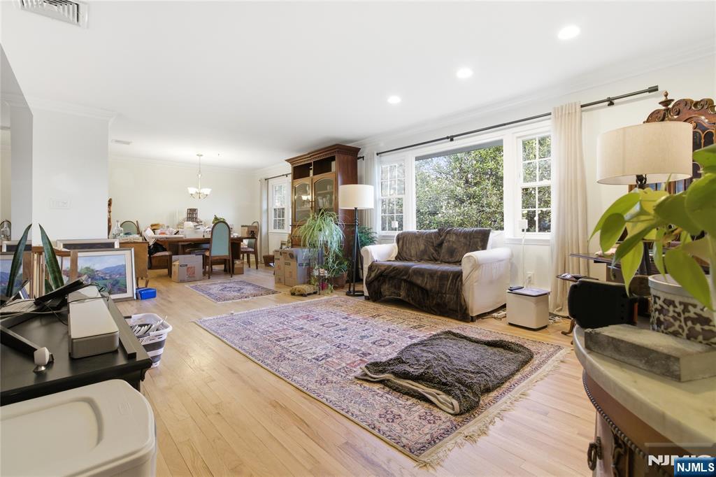 120 Carlough Road Upper Saddle River, NJ 07458 - Photo 3 of 25 a living room with furniture rug and a table