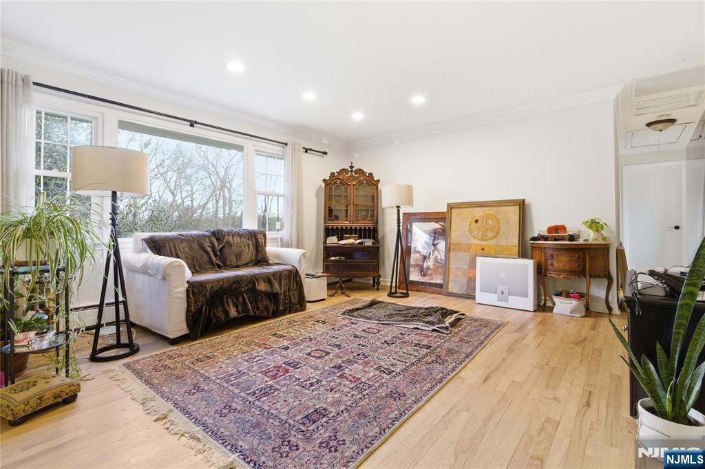 120 Carlough Road Upper Saddle River, NJ 07458 - Photo 4 of 25 a living room with furniture and a rug