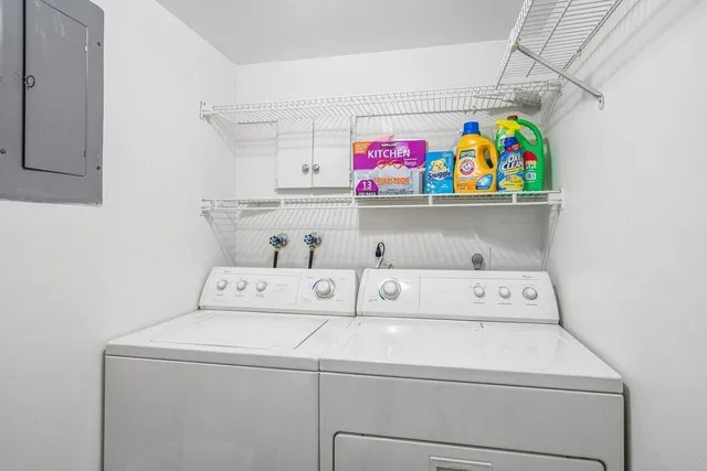 a utility room with dryer and washer