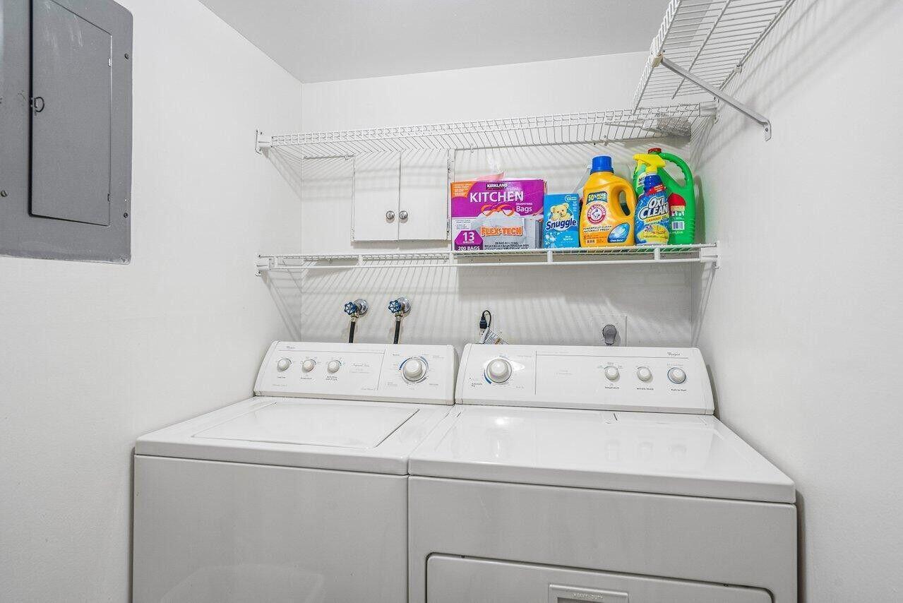 6200 Northwest 2nd Avenue, Unit 415 Boca Raton, FL 33487 - Photo 27 of 31 a utility room with dryer and washer