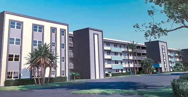 a front view of building with yard