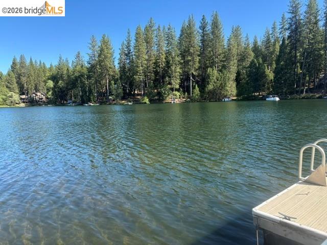 19711 Pleasantview Drive Groveland, CA 95321 - Photo 13 of 39 Expansive lakefront setting with a private dock featuring access steps